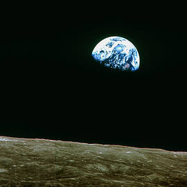 Earthrise Over Moon by Science Photo Library