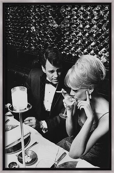 A Glamorous 1960s Couple Dining Framed Canvas Print
