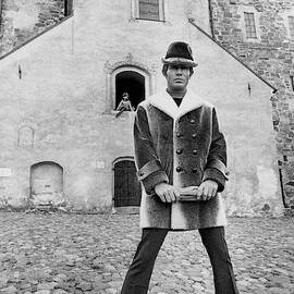 A Model In A Double-breasted Coat With Eight by Leonard Nones