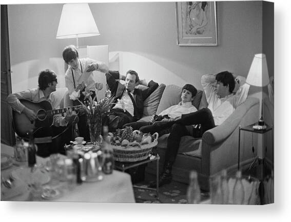 Beatles In Paris Canvas Art Print by Harry Benson