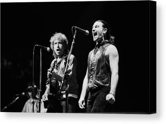 Bob Dylan Performs With U2 In Concert Canvas Art Print by George Rose