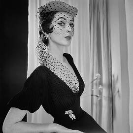 Dovima Wearing Veiled Hat  by Horst P Horst