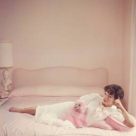 Joan Collins Relaxes by Slim Aarons