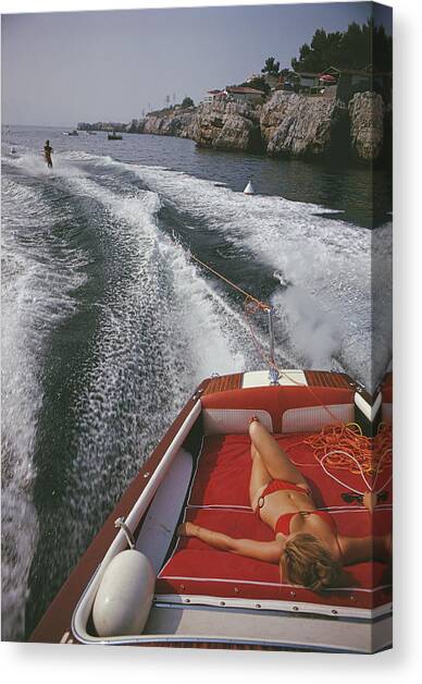 Leisure In Antibes Canvas Art Print by Slim Aarons
