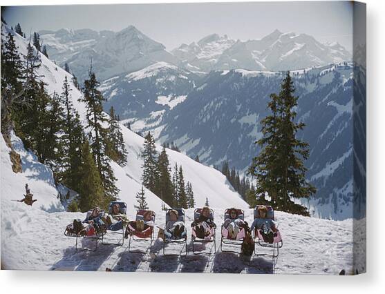 Lounging In Gstaad Canvas Art Print by Slim Aarons