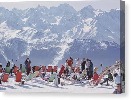 Lounging In Verbier Canvas Art Print by Slim Aarons
