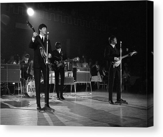 Members Of The Beatles Pop Group Canvas Art Print by Popperfoto