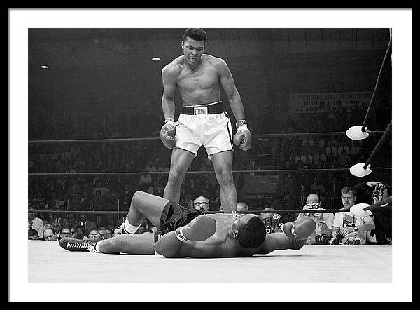 Muhammad Ali Taunting Sonny Liston Framed Print