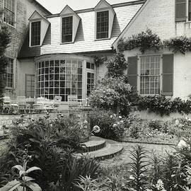 Outdoor Dining Area At The Greenhalghs Home by Tom Leonard