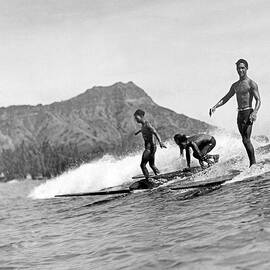 Surfing In Honolulu by Underwood Archives