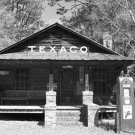 This Old Texaco Station Black and White by Melanie Snipes