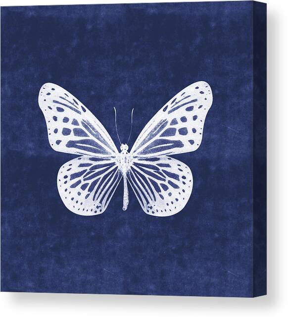 White and Indigo Butterfly- Art by Linda Woods Canvas Art Print by Linda Woods